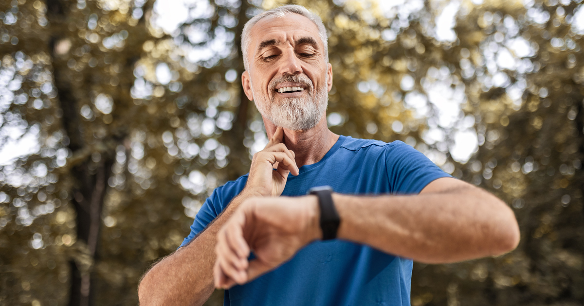 Man looking at watch