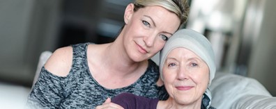 A person with a head wrap and a person with a head wrap
Description automatically generated
